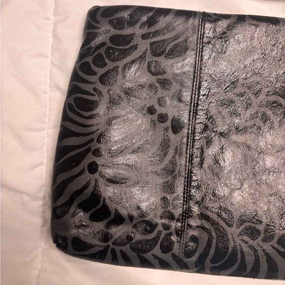Hand painted one of a long grey and black clutch purse.